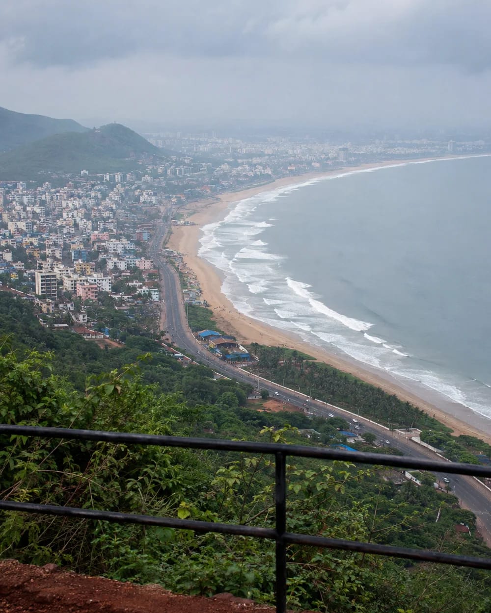Visakhapatnam's curving coast and city seen from the hills above the Bay of Bengal